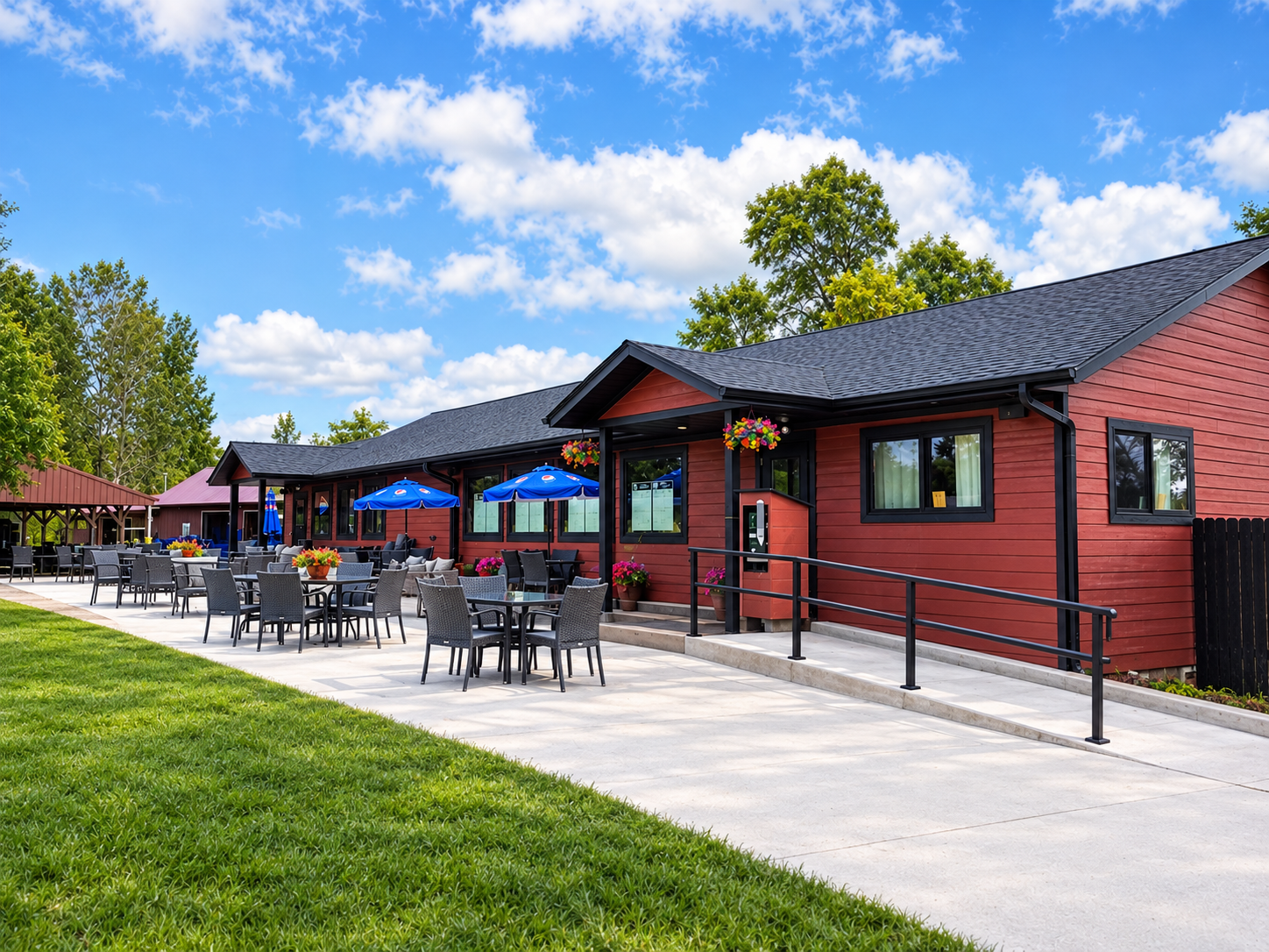 Clubhouse exterior with outdoor patio seating
